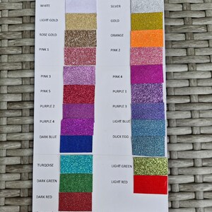 May include: A color chart with glitter swatches in various colors, including black, white, charcoal, silver, light gold, gold, rose gold, orange, pink, purple, light blue, dark blue, duck egg, turquoise, light green, dark green, light red, and dark red. The chart also includes the text "If you need a colour that has not been listed, send me a message and hopefully I can help."