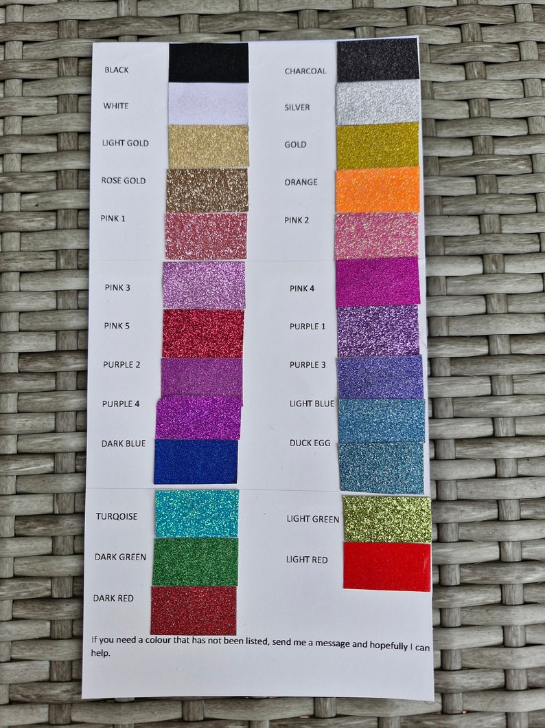 May include: A color chart with glitter swatches in various colors, including black, white, charcoal, silver, light gold, gold, rose gold, orange, pink, purple, light blue, dark blue, duck egg, turquoise, light green, dark green, light red, and dark red. The chart also includes the text "If you need a colour that has not been listed, send me a message and hopefully I can help."