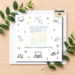 May include: A white Father's Day card with the text "BEST DAD EVER" in blue, yellow, and green. The card features computer-related doodles and the message "Wishing you a very Happy Father's Day!" Decorative sprigs frame the card.