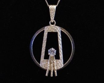Modernist Circular Silver pendant with Blue spinel by Edvard Kinni, Turku (1970)