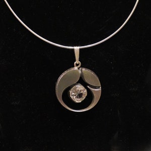 Silver pendant with rock crystal, designed by Karl Laine for FinnFeelings, Finland