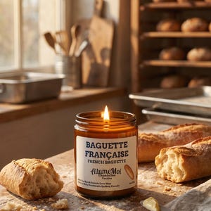 May include: A lit candle in a glass jar labelled "Baguette Française" sits on a wooden surface with bread and a knife. The candle's flame glows brightly. The scene evokes a bakery or kitchen setting.