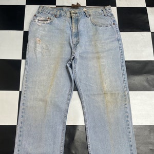 Vintage 90s Levi&#39;s 505 Jeans: Faded Blue Distressed Denim, Waist 36