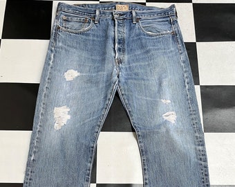 Vintage Levis 501 Jeans: Distressed Faded Blue Denim, Men's waist 34