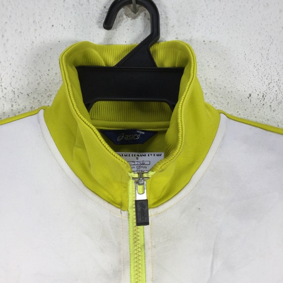 Asics yellow running jacket hotsell