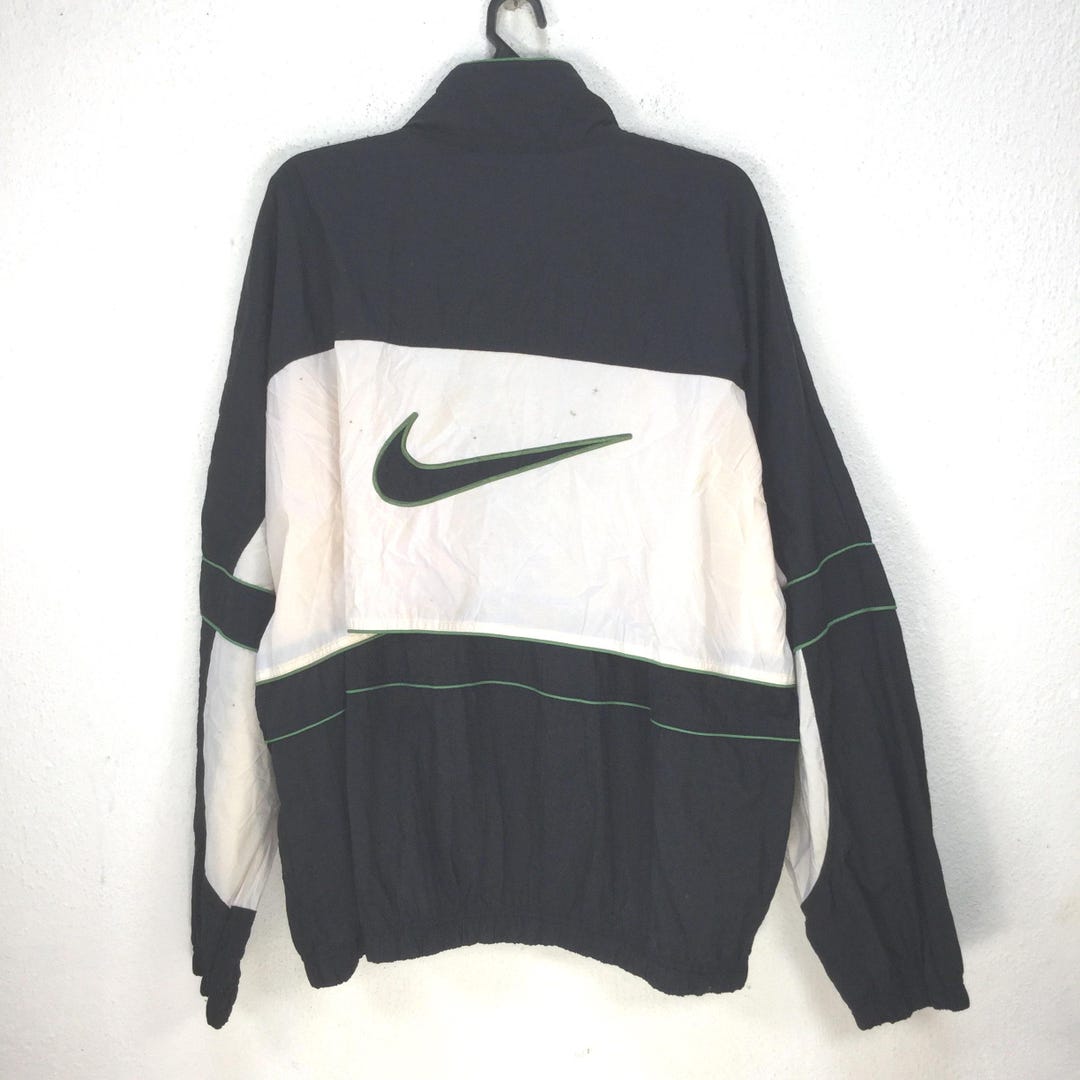 Nike ジップアップ白黒　90s ユーロ　イギリス製　ギミック　半袖 Nike ジップアップ白黒 90s ユーロ イギリス製 ギミック 半袖