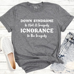 Maglietta per la consapevolezza della sindrome di Down, la sindrome di Down non è una tragedia, regalo per la sindrome di Down, magliette unisex per la consapevolezza di adulti, bambini e giovani
