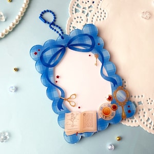 Portatarjetas de acrílico para fotos Kpop, llavero con lazo, práctico y bonito accesorio para regalo de fans del K-Pop.