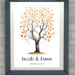 May include: A framed watercolour painting of a tree with orange and yellow leaves. The tree is surrounded by a white background with the text "Jacob & Emma" and "October 18, 2019" below the tree. The text "GUESTBOOK BY SERGIO" is in the top right corner of the image.