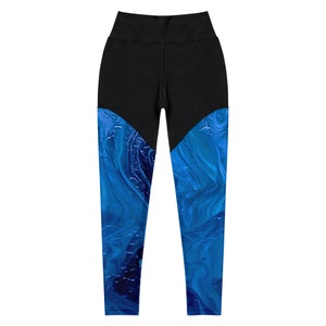 May include: Black leggings with a blue and black marbled pattern on the lower legs.