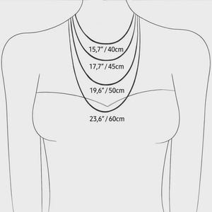 May include: A diagram showing the lengths of four necklaces. The necklaces are displayed at 15.7 inches/40cm, 17.7 inches/45cm, 19.6 inches/50cm, and 23.6 inches/60cm. The image is of a person from the neck down, wearing the necklaces.