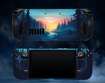 May include: A handheld gaming console with a custom skin featuring a landscape design. The skin showcases a forest scene with a river, mountains, and a sunset in shades of blue, orange, and teal. The console has black buttons and a screen.