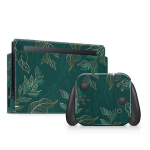 May include: A green and gold Nintendo Switch console and controller skin with a leafy pattern. The design features gold leaf outlines on a dark green background.