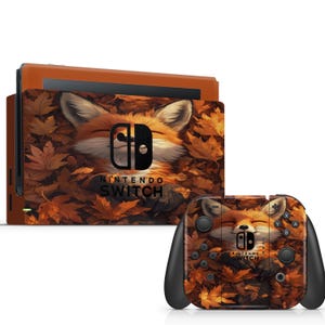 May include: Nintendo Switch console and controller skin featuring a fox design. The skin has a brown and orange color scheme with a fox face surrounded by autumn leaves. The text "Nintendo Switch" is visible.