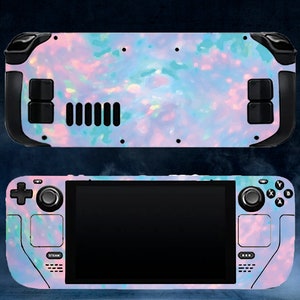 May include: A handheld gaming console skin featuring a colorful, abstract opal design in shades of blue, pink, and white. The skin covers the front and back of the device, with cutouts for buttons and vents. The console has a black screen and controls.