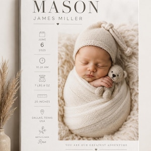 May include: A rectangular canvas print featuring a photograph of a swaddled newborn wearing a knit hat and holding a small teddy bear. The text includes the name MASON JAMES MILLER, birth details: June 6 2025, 10:01 AM, 7 LBS 8 OZ, 20 INCHES, DALLAS, TEXAS USA, and the birth flower Rose, with the phrase YOU ARE OUR GREATEST ADVENTURE.