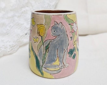 Ceramic mug — handpainted dainty cat sitting among tulips and aquilegia