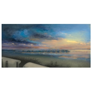May include: A painting of a pier extending into the ocean at dusk. The sky is a mix of blues, oranges, and yellows, with dark clouds overhead. The pier is lit with lights, and the water reflects the colors of the sky.