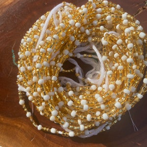 Purity /Wealth waist beads/ women waist beads/ African waist beads/ waist beads/ tie on waist beads/ up 50 inches long.