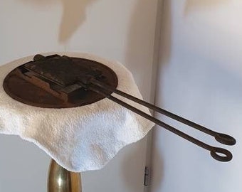 Antique marked waffle maker with holder