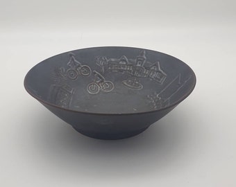 Bertil Lundgren for Rörstrand.  A Small Petrol Glaze Bowl Decorated with Historical Scenes in Relief. 1970s.
