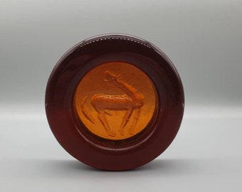 Erik Höglund for Boda, Sweden. A Heavy, Moulded Amber Glass Dish with Stylised Stallion in Relief.