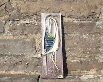 A Glazed Ceramic Wall Plaque by Helmut Friedrich Schäffenaker of Germany.
