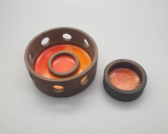 Bo Borgström of Sweden. A Glazed, Pierced Ceramic Candle Holder. Factory mark to the base.