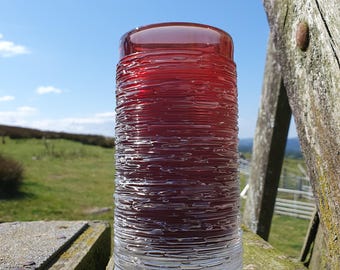 Bengt Edenfalk for Skruf, Sweden. A cylinder form, glass vase from the "Spun" series. 1960s.