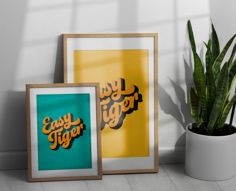 Easy Tiger Retro Halftone Word Art Print in Turquoise and yellow framed examples, Easy Tiger Retro Halftone Word Art Print,  Bold and Bright Typographic Art Print,  Funny Tiger Quote Print. Fun Tiger Wall Art