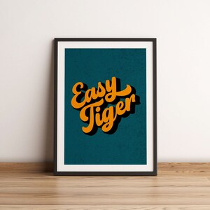 Easy Tiger Retro Halftone Word Art Print in Teal Easy Tiger Retro Halftone Word Art Print,  Bold and Bright Typographic Art Print,  Funny Tiger Quote Print. Fun Tiger Wall Art
