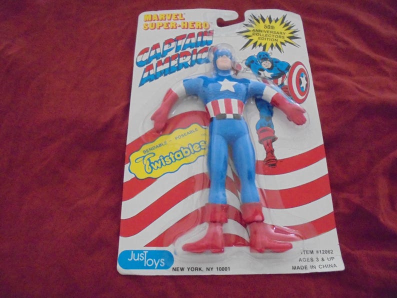 May include: Captain America action figure on a card. The figure is blue, red, and white, with the text "Marvel Super-Hero Captain America" and "Twistables". The packaging reads "50th Anniversary Collectors Edition".