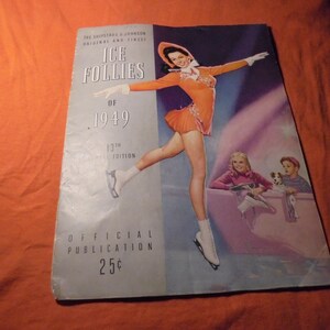 May include: Vintage Ice Follies of 1949 official publication. The cover features a woman in an orange ice skating costume, with white gloves and ice skates. The cover also includes the text "Ice Follies of 1949".
