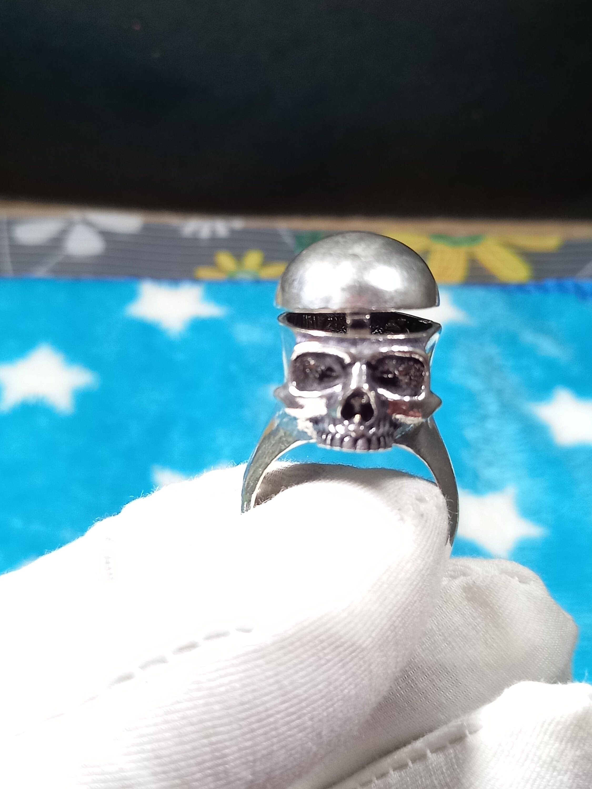 Hidden compartment online skull ring