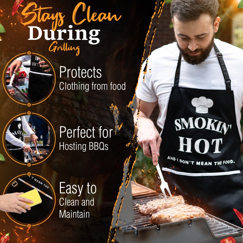 Puede incluir: Delantal de barbacoa negro con el texto "Smokin' Hot and I don't mean the food." El delantal lo lleva puesto una persona que est&aacute; asando carne en una barbacoa.