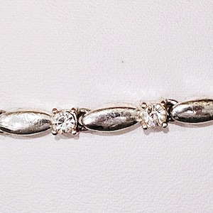 Avon Vtg Signed Cubic Zirconia Silver Plated Adjustable Length Tennis Bracelet