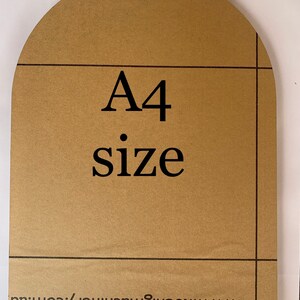 May include: A tan-coloured, arched-top sheet with the text "A4 size" in black. The sheet has horizontal and vertical lines, and the website address www.koenigmachinery.com.au is printed at the bottom.