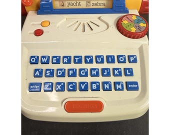 Tectron Giocattolo elettronico educativo Macchina da scrivere QWERTY Gioco di ortografia per bambini VIDEO