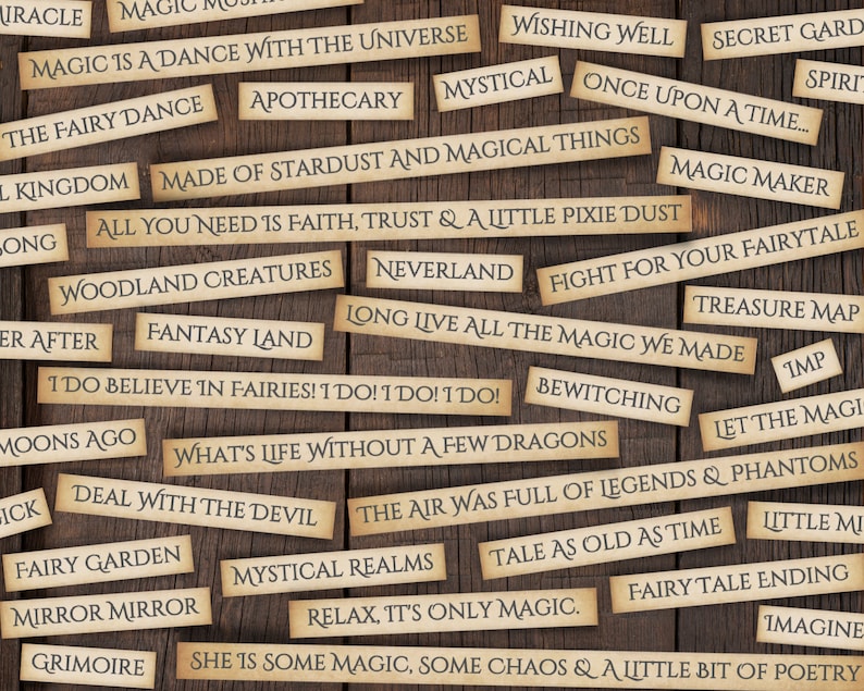 May include: A wooden background with various paper strips with magical phrases written on them. The phrases include "Magic is a dance with the universe", "All you need is faith, trust & a little pixie dust", "Fight for your fairytale", "What's life without a few dragons", "The air was full of legends & phantoms", "Relax, it's only magic", and "She is some magic, some chaos & a little bit of poetry".