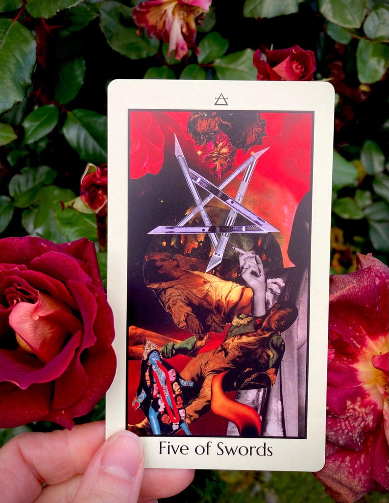 May include: A tarot card with a collage of images, including a silver star, figures in brown clothing, and a blue figure. The card is labeled "Five of Swords" in white text. The background features red and dark green hues.