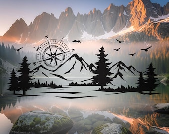 May include: A scenic landscape featuring a mountain range, a lake, and a compass design. The black compass, mountains, trees, and birds are silhouetted against a backdrop of a sunset over the mountains. The lake reflects the scene.