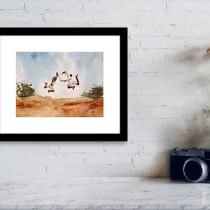 May include: Watercolor painting of two people jumping in the air with their arms outstretched. The painting is set against a blue sky with white clouds. The people are wearing red and white clothing. The painting is framed in black.