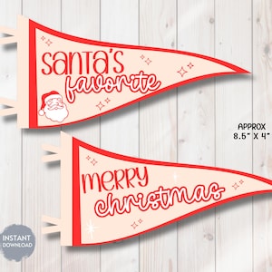 Peut inclure: Deux décorations de Noël en forme de fanion. Le fanion supérieur indique "Santa's Favorite" avec un dessin du Père Noël. Le fanion inférieur indique "Merry Christmas". Chaque fanion mesure environ 21,6 cm x 10,2 cm.