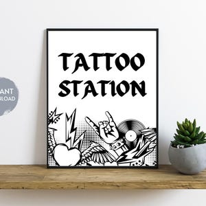 May include: Black and white printable sign with the text "Tattoo Station" in a bold font. The sign features a graphic of a hand with a lightning bolt and a record.