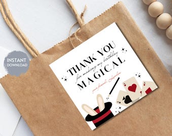 May include: Thank you for making my birthday magical, your friend Landon. A white card with black text and a black and red magician's hat with bunny ears, playing cards, and a magic wand.