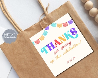 May include: A white thank you tag with colorful paper cutouts in the shape of flags. The text reads "THANKS for spicing up this celebration! 11.02.24"
