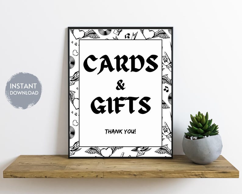 May include: Black and white printable sign with a decorative border of hearts, wings, and musical notes. The sign reads "Cards & Gifts Thank You!"