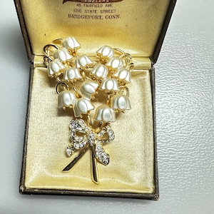 Vacker vintage 1990-tals KENNETH JAY LANE Lilly of the Valley signerad kristall strassbrosch