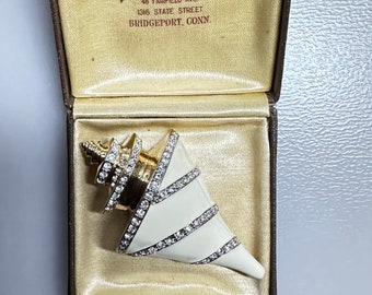 Hermoso broche de cristal y esmalte de caracola LANDAU vintage de 1990