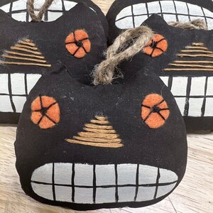 Handmade primitive cat face ornaments